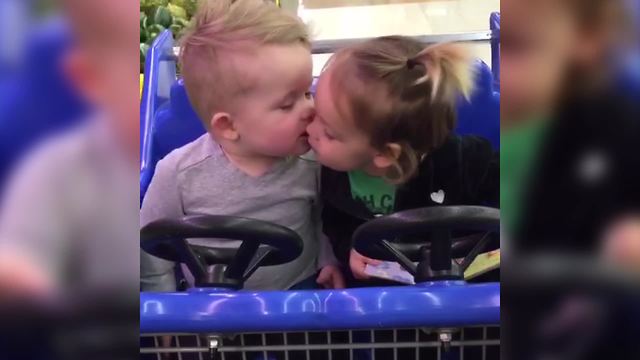 Toddler Kiss In A Toy Car