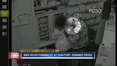 Robber threatens to shoot pharmacist in the head if she makes a sound