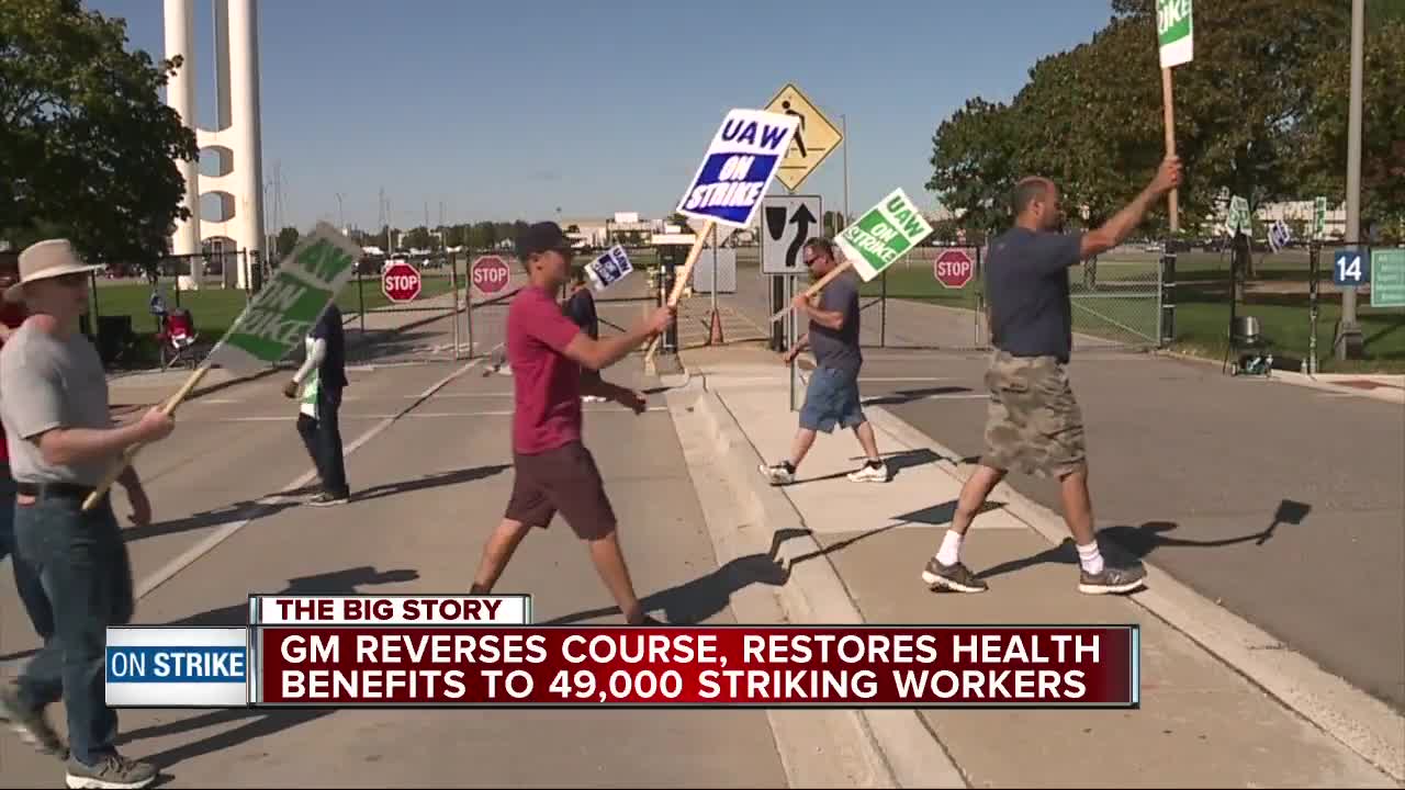 GM reinstates health care benefits for striking UAW members