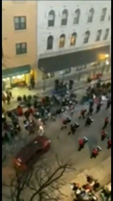 Caution ⚠️ graphic truck plows into Christmas parade.