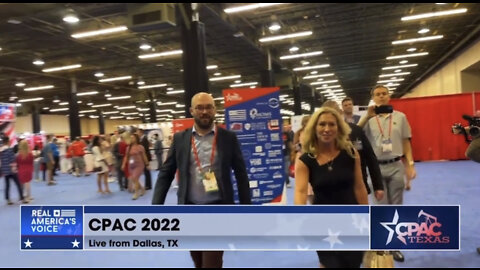 Marjorie Taylor Greene enters the Real America’s Voice set at CPAC Dallas