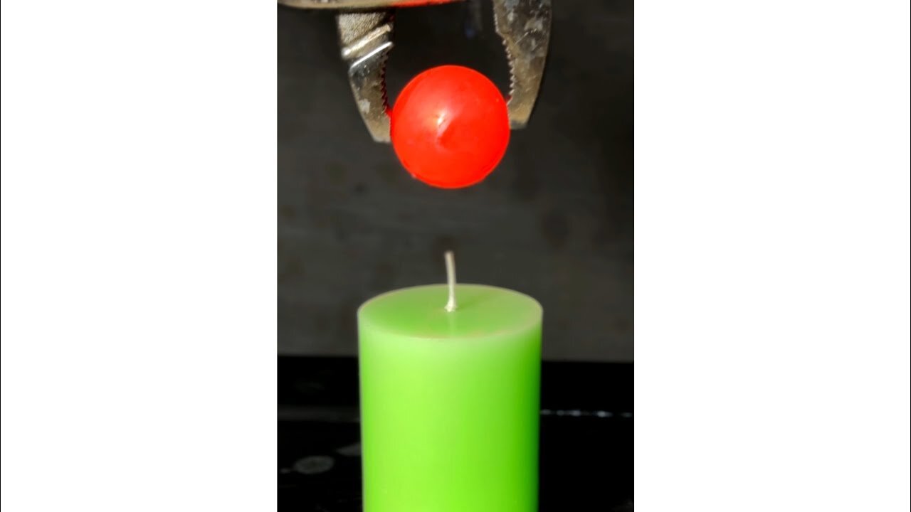 1000 degree Red Hot Metal Ball vs Candle.