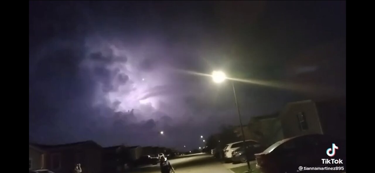 DOUBLE RING GIANT UFO AMID LIGHTNING STORM