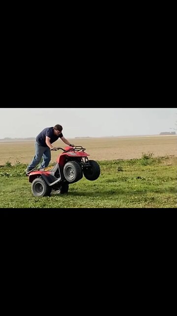 Tim doing a wheelie on a quad #shorts