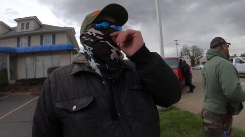 Protester at the Karl Manke Barbershop in Owosso Michigan