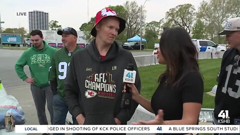 Daniela talks to Raiders fan by Experience Entry