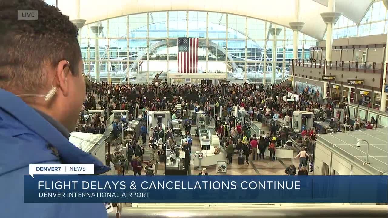 Denver International Airport flight delays, cancelations Christmas Eve morning