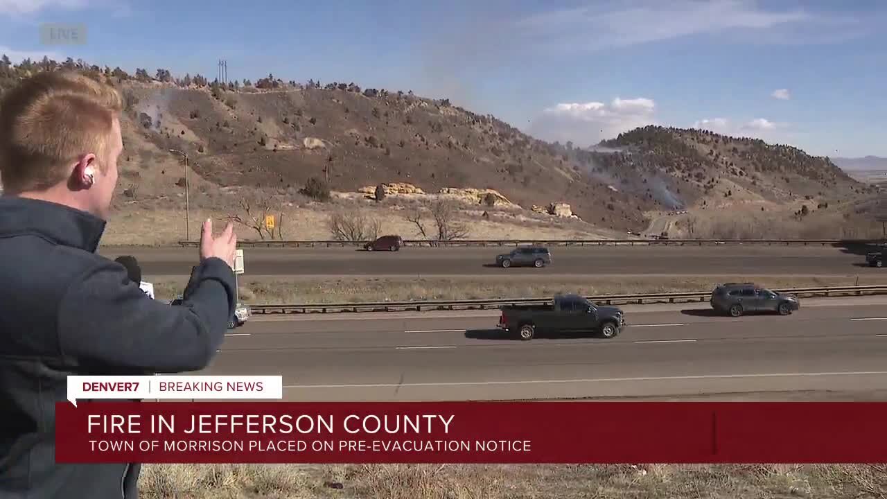 A look at crews battling Hogback Fire burning near Morrison