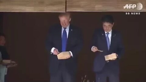 Trump Feeds Koi Fish