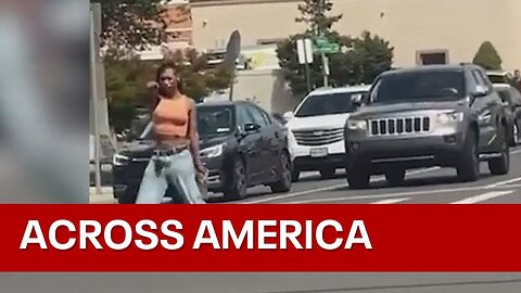 Across America: Video shows woman waving gun in middle of intersection