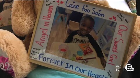 Neighbors build sign letting drivers know slow down, after 5-year-old killed by hit and run