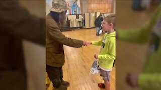 Picture captures kindness at Denver Community Church event