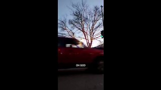 Car drives through Waukesha Christmas parade