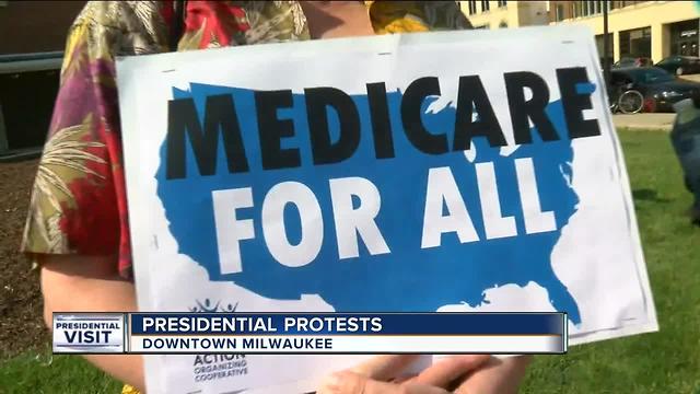 Trump protesters gather outside of private event