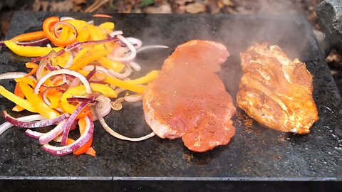 Steak on a rock, delicious spicy beef