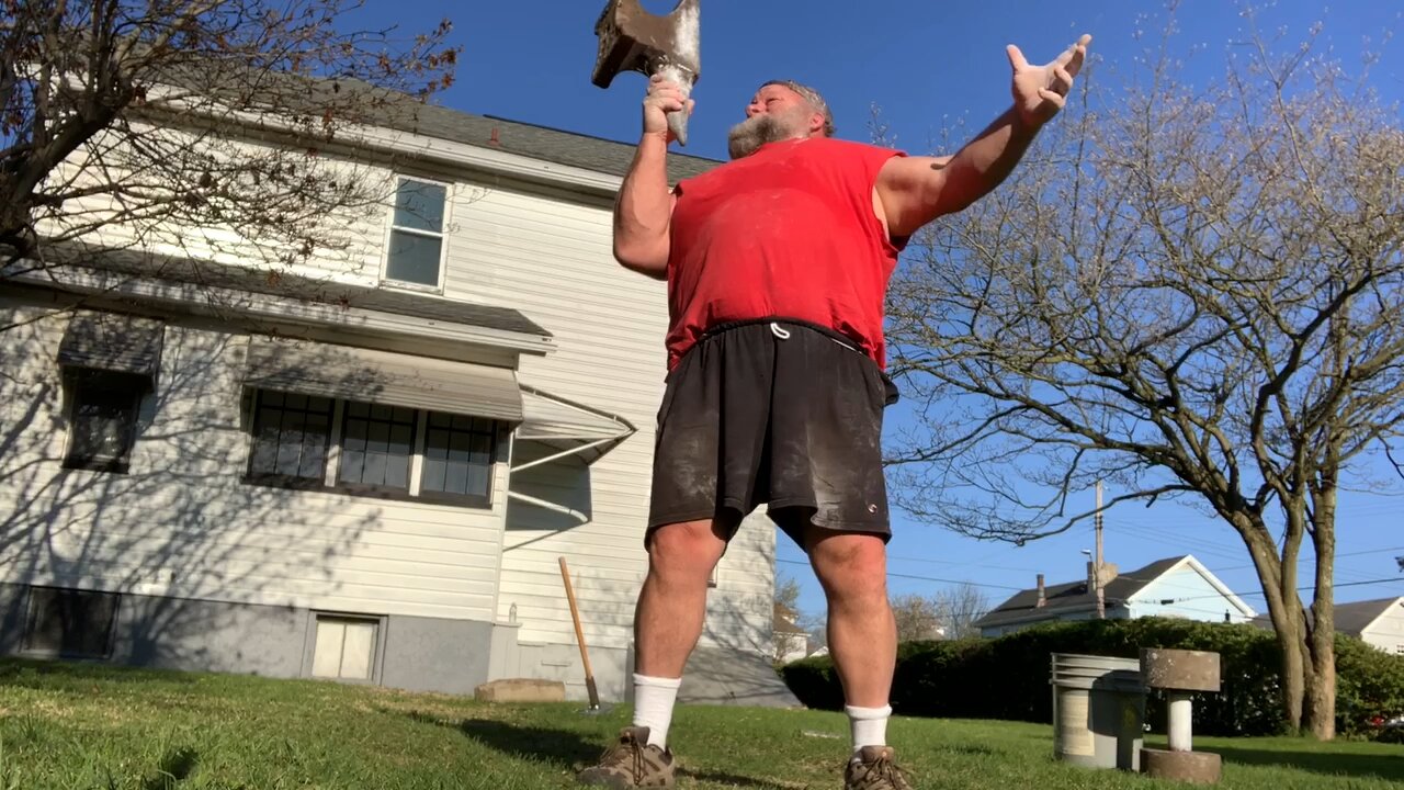 Lifting 79 pound anvil by horn.