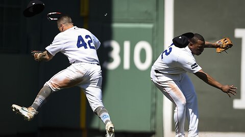 MLB Rafael Devers and Tyler O'Neil collide