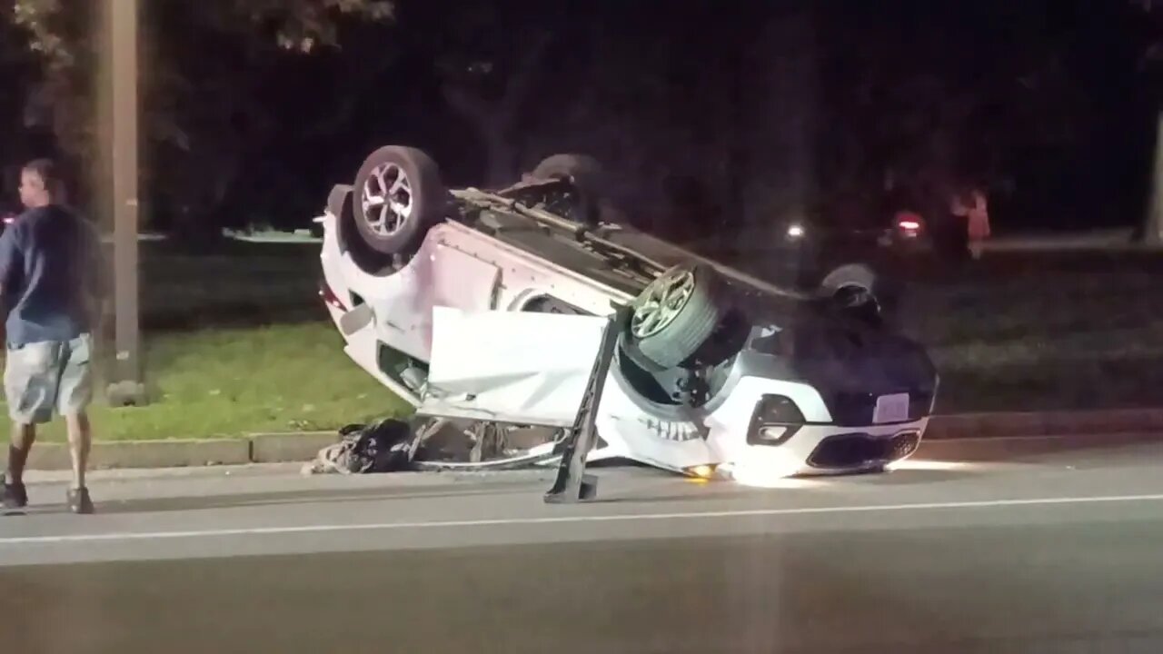 Boston and state police respond to a car rollover on the jamaicaway