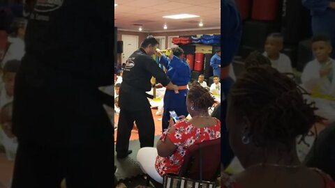 Michael getting his orange belt