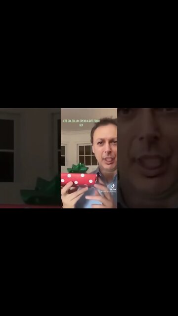 Jeff Goldblum opens a gift from Sly