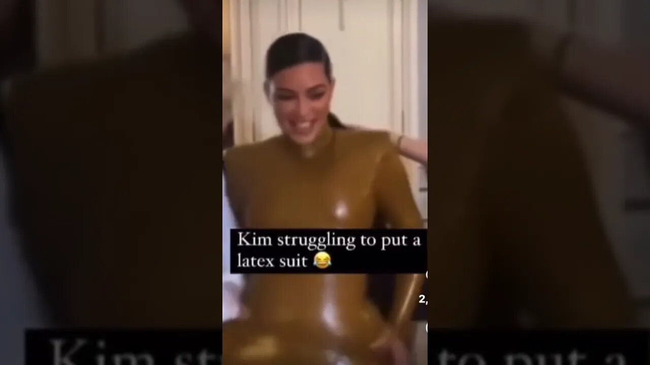 Kim Struggling to wear Latex Suit