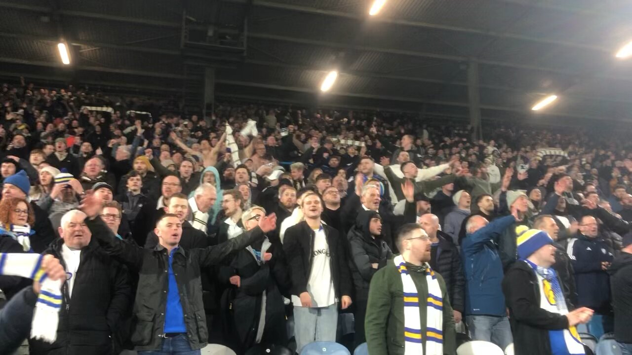 Leed United v Leicester 3-1 24/2/24 fans celebrate at end of match. Marching on together