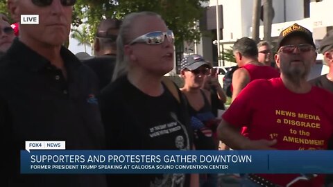 Supporters and protestors gather as Trump prepares to speak in Fort Myers