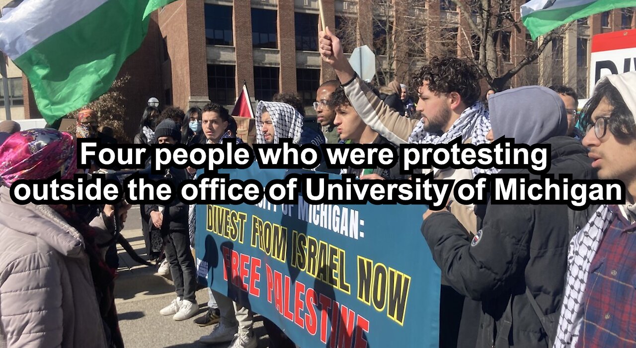 Four people who were protesting outside the office of University of Michigan