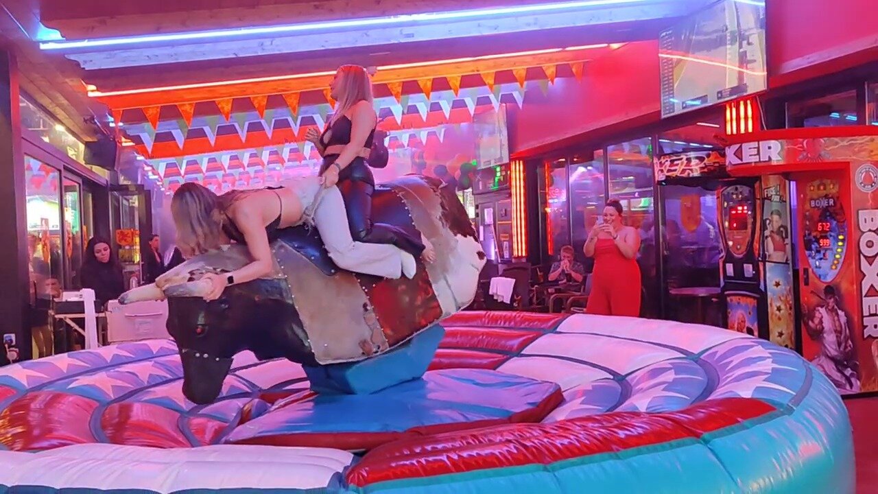 Midnight mechanical bull riding