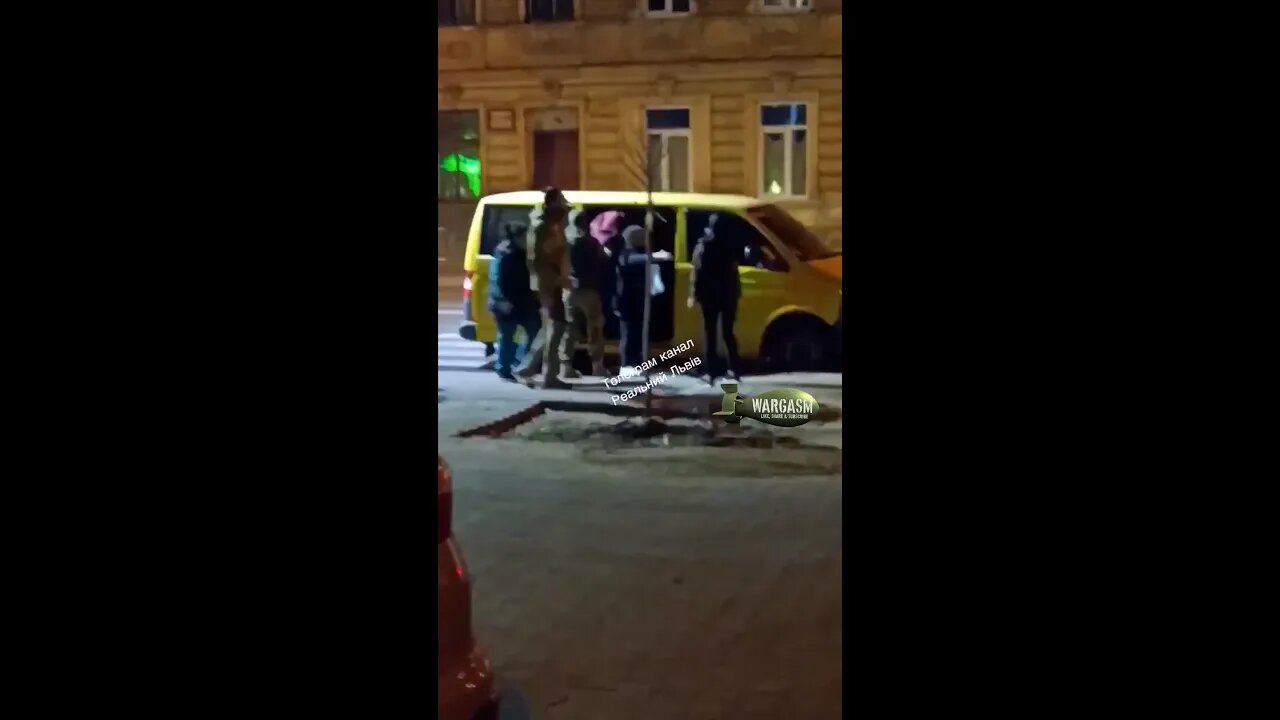 Women in Lviv try to stop a man from being mobilized