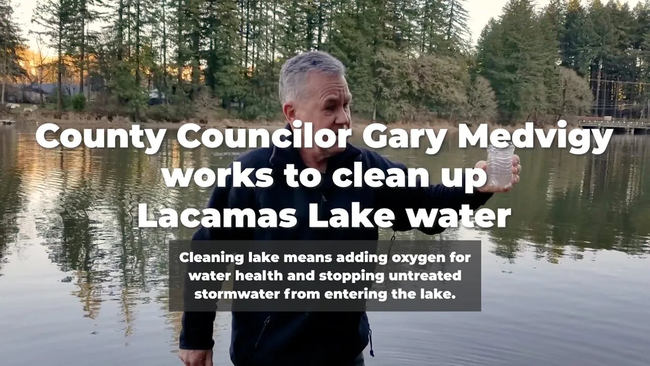 County Councilor Gary Medvigy works to clean up Lacamas Lake water