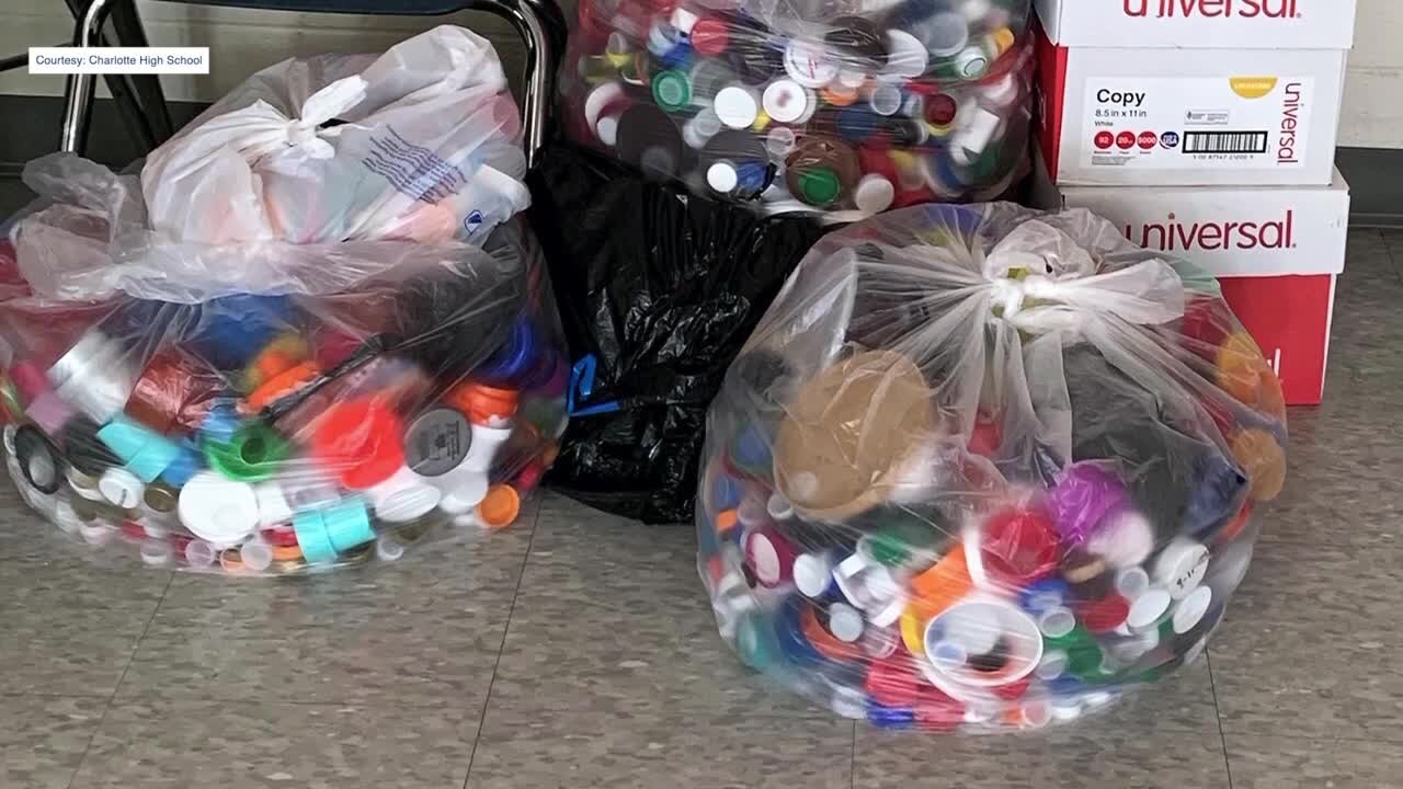 After collecting, washing, and sorting more than 250 pounds of bottlecaps and lids students in the functional independence program at Charlotte High School saw their hard work rewarded with a new bench made out of the recycled products