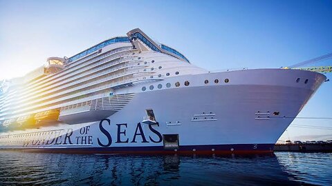 "Serene Sailing: A Relaxing Boat Ride Through a Blue Clear Sea"