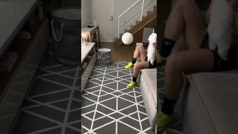 Model doing football tricks