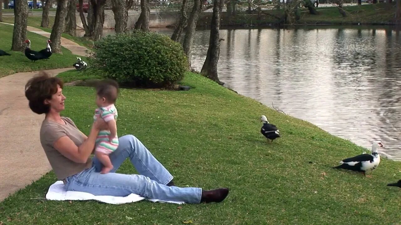 grandmom and baby at the river