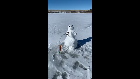 Ice fishing snowman