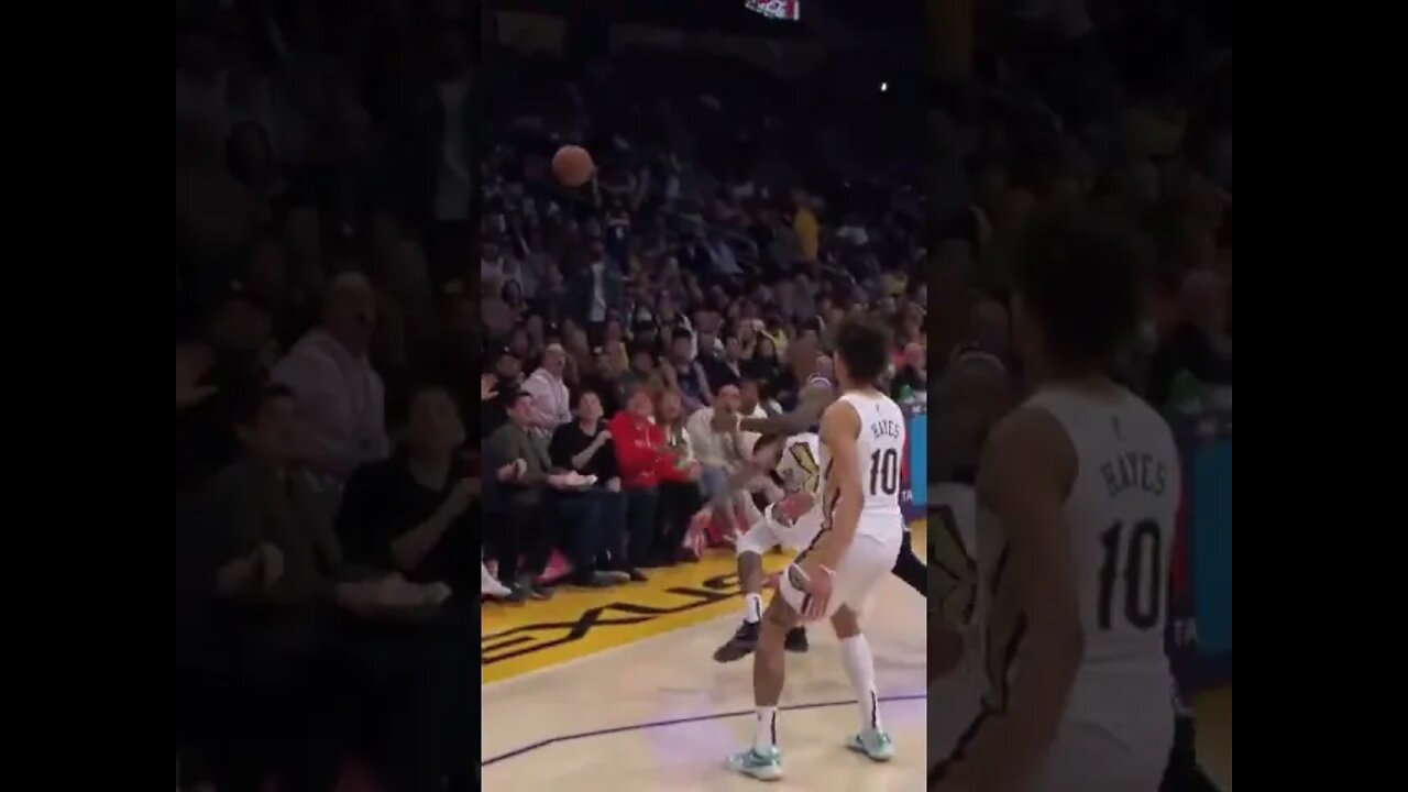 LBJ Flies Into The Stand On Extra Effort Play