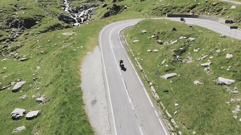 Aerial View Motocyclist In Mountains