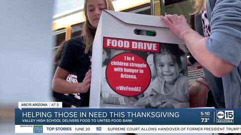 Students surprise United Food Bank with a bus full of food