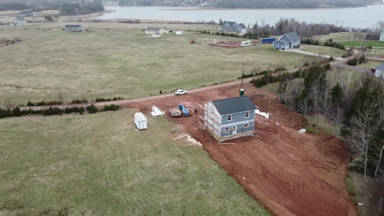 Helix shot of a house being built