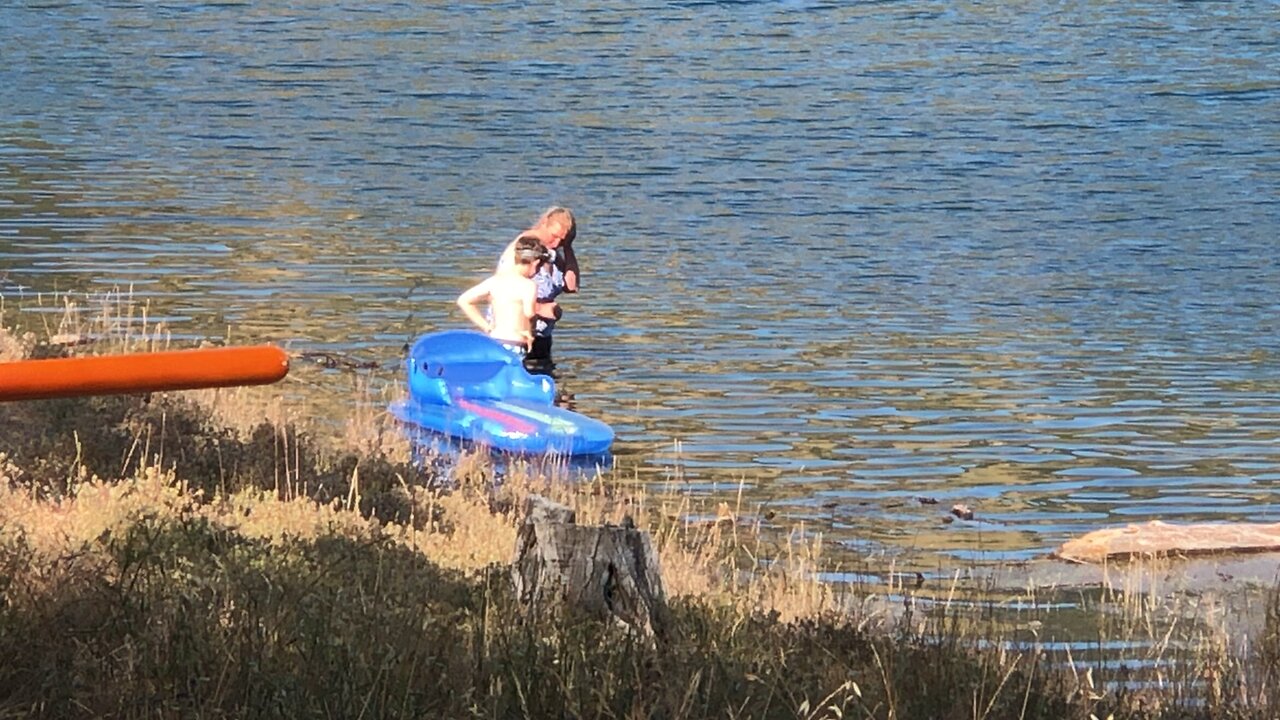 Austin Pushing Katie in the water from my last storie