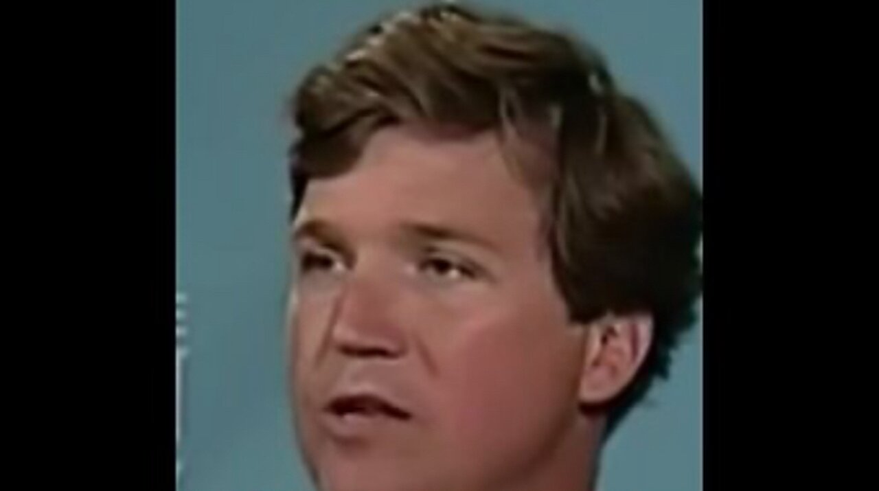 Young Tucker Carlson answers question from crowd