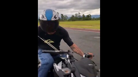 One Armed Motorcycler Can Pull A Wheely Like it's Nobodies Business