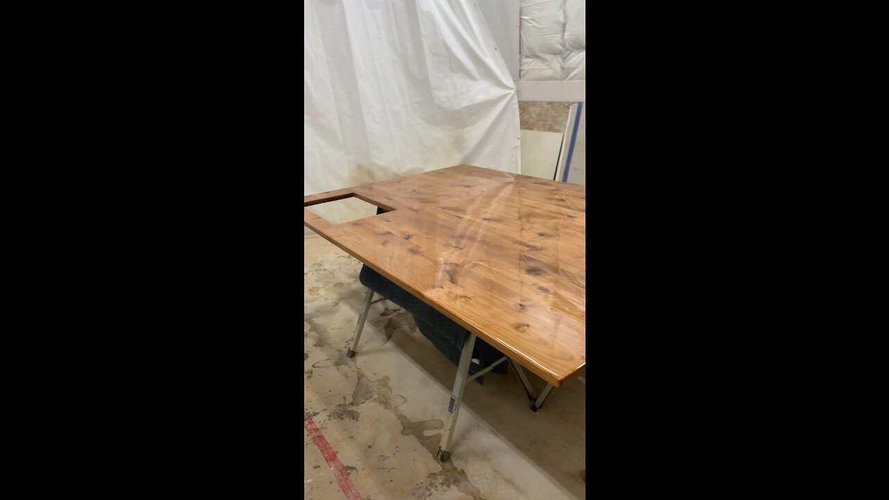 Epoxy resin flood coat on solid alder island countertop