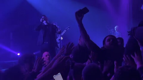 Crowd surfing during Dayseeker Neon Grave