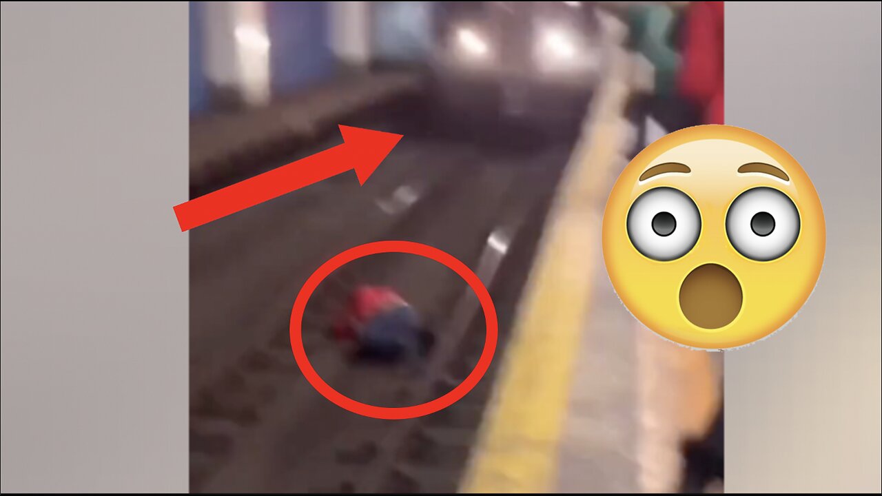 Train Comes Charging at Man Lying on Tracks