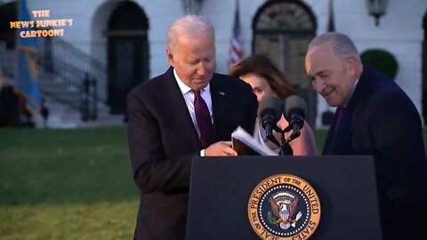 Biden trying to find a mask at the maskless event when no one was wearing a mask including himself.