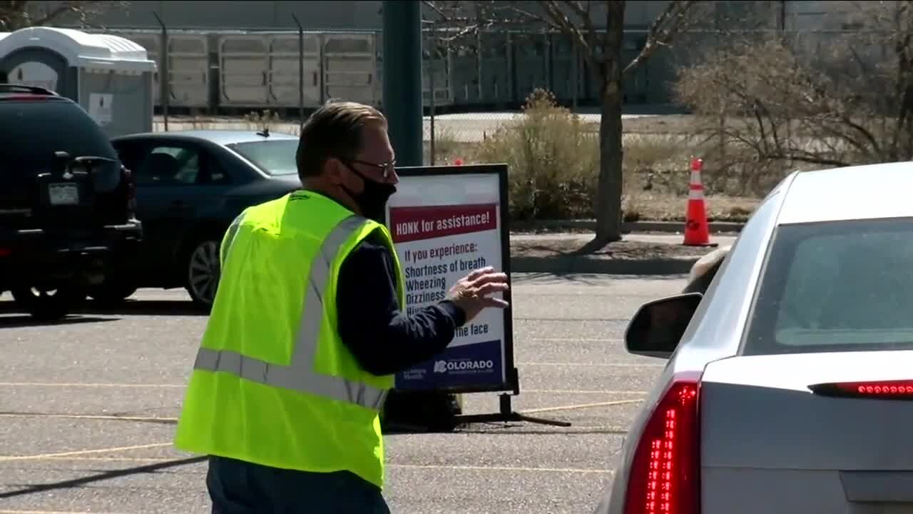 Colorado to open large vaccination sites as employer-mandates begin