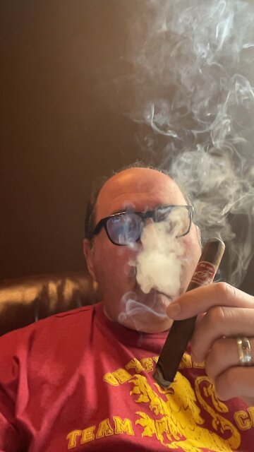 Cigar smoking slow mo.