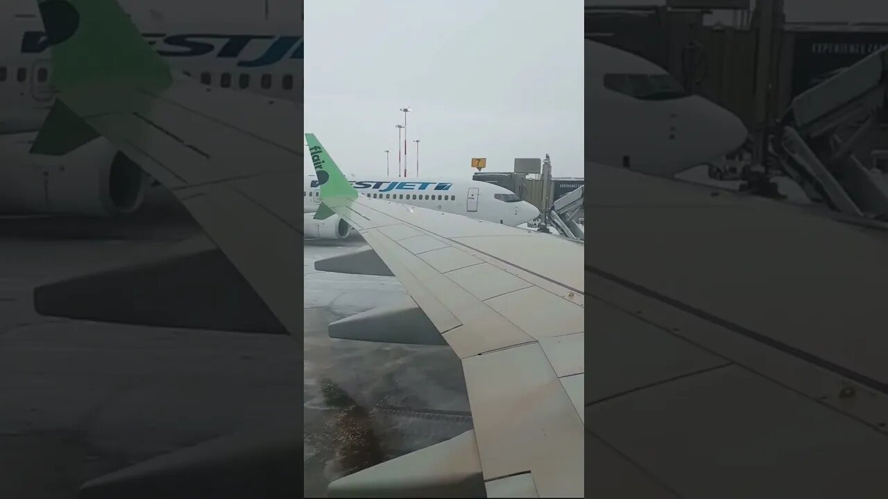 Deicing a Airplane in Kelowna